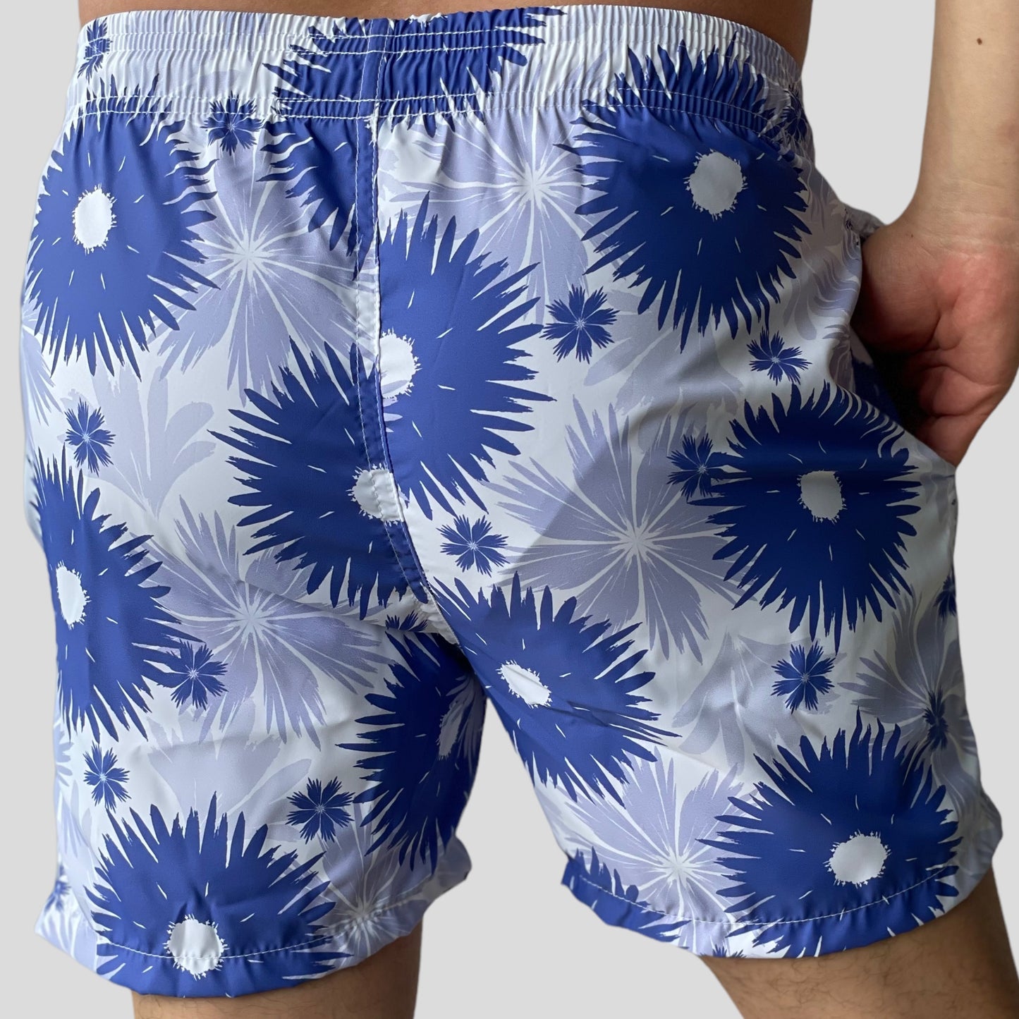 Pantaloneta de baño con diseño flores lila