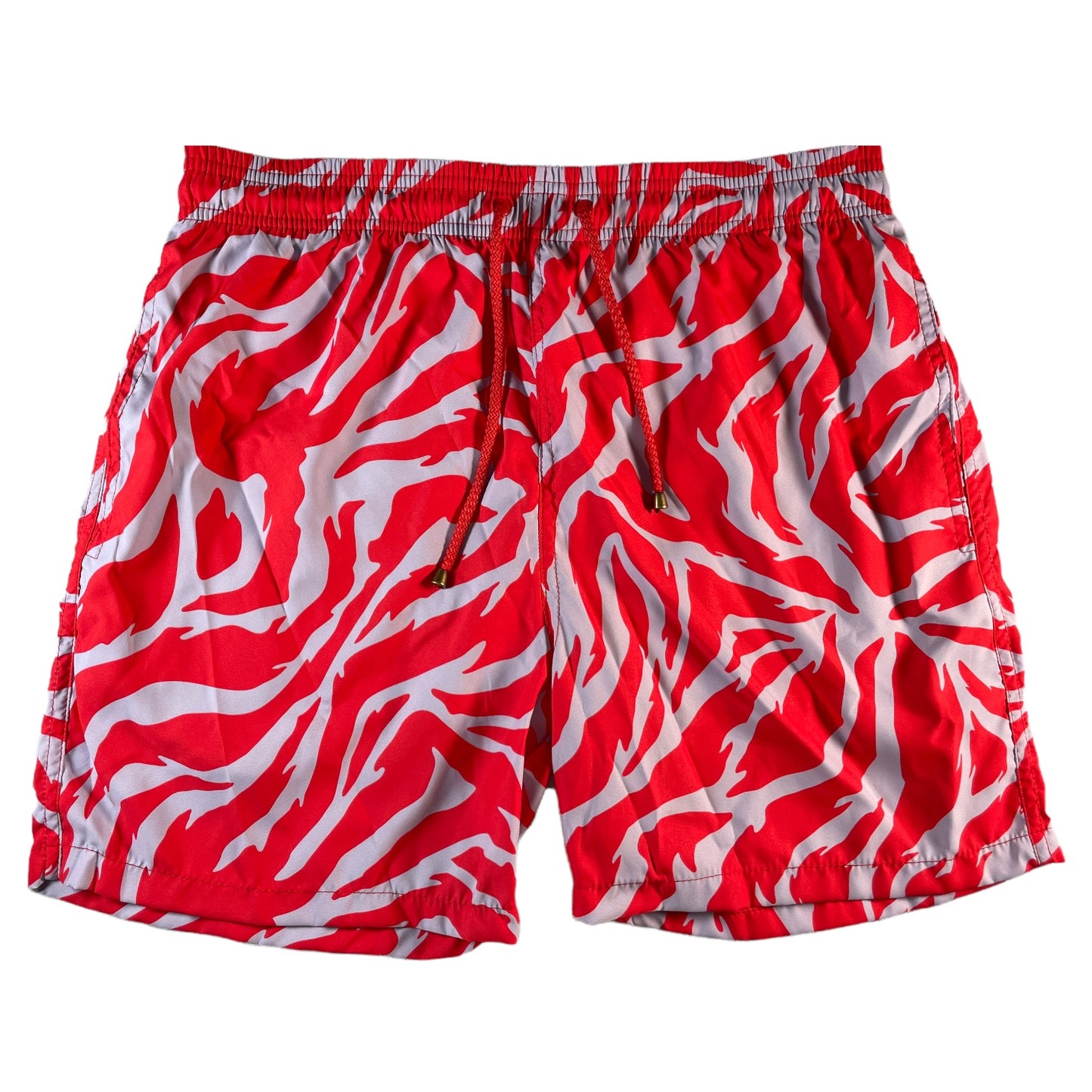 Pantaloneta de baño con diseño animal print rojo y lila